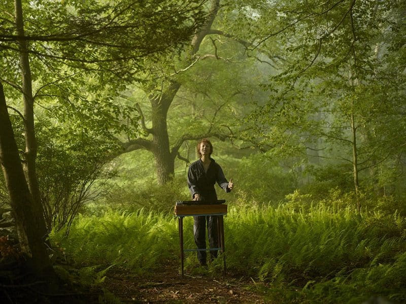 music artist majel connery performance photo in a grand forest